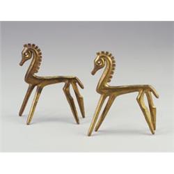 Pair of FREDERICK WEINBERG cast brass stylized horses. Original patina. Each stamped copyright...