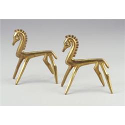 Pair of FREDERICK WEINBERG cast brass stylized horses. Original patina. Each stamped copyright...