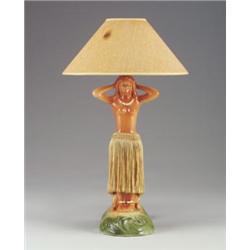 Ceramic hula dancer table lamp, c. 1950, with rotating hip motion (functional) in amber, green an...