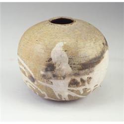 TOSHIKO TAKAEZU stoneware spherical vessel with flattened sides, dipped in white, umber, and mott...