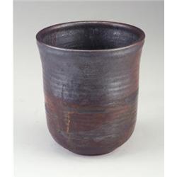 TOSHIKO TAKAEZU stoneware open vessel with dipped and poured mahogany and umber crystalline glaze...