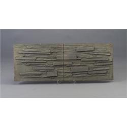 Horizontal architectural frieze, two contiguous tiles in gray clay with abstract structural forms...