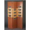Image 1 : EUGENE SCHOEN three-panel folding brown and tan laminate screen with cut-outs fitted with brass s...