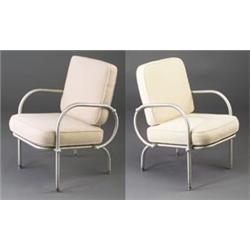 Two WARREN McARTHUR tubular brushed-aluminum armchairs with loose off-white fabric cushions. Some...