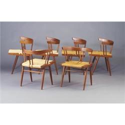 Six GEORGE NAKASHIMA grass seated barrell chairs. Three chairs possibly reseated, minor stain to...