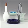 Image 1 : Five assorted glass items: an opaque pale green flaring vase, a thick-walled cased bowl in pale b...