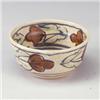 Image 1 : CHARLES M. HAUDER stonware bowl decorated with leaf and flower band in brown green and black on a...