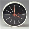 Image 1 : HOWARD MILLER electric wall clock with white enamel case, black face and red hands. Howard Miller...