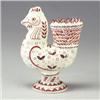 Image 1 : CARL WALTERS vase in the shape of a rooster decorated in maroon and black on a glossy buff ground...
