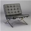 Image 1 : Barcelona style armless lounge chair with black vinyl tufted cushions on bright chrome frame. Som...