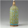 Image 1 : Tall ceramic lamp with acid green and red squiggles on a turquoise ground. Unmarked. Overall: 38...