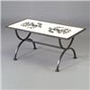 Image 1 : JEAN LURCAT French Art Deco coffee table, c. 1950, with wrought-iron trestle-frame inset with eig...