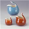 Image 1 : Three EVA ZEISEL town and country pitchers, large, medium and creamer; one blue, two brown exteri...