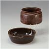 Image 1 : Two ceramic bowls by WARREN McKENZIE both covered in dark brown glazes. One embossed with M on ba...