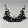 Image 1 : Pair of black-enameled bronze and ivory Art Deco figural bookends, in the style of Gerado, depict...