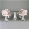 Image 1 : RUSSELL WOODARD extruded aluminum glass-topped table and four chairs with vinyl cushions. One pie...