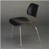 Image 1 : CHARLES EAMES for HERMAN MILLER DCM chair with tubular chrome frame and black finished bentwood s...