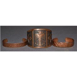 THREE COPPER BRACELETS