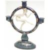 Image 1 : An Austrian Goldscheider 3-light candelabrum formed as a dancing nude lady within a hoop, on oval...