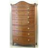 Image 1 : A Regency mahogany bowfront chest on chest with arch and roundel cornice over 7 graduated long dr...