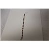 Image 1 : 14KT. YELLOW GOLD RUBY BRACELET CONSISTING OF 16 OVAL SHAPED BEZEL STYLE LINKS,