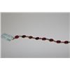 Image 2 : 14KT. YELLOW GOLD RUBY BRACELET CONSISTING OF 16 OVAL SHAPED BEZEL STYLE LINKS,