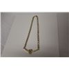Image 1 : 18KT. YELLOW GOLD SET NECKLACE WHICH FEATURES A RIGID DIAMOND SET