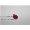 Image 2 : ONE 14KT WHITE GOLD RUBY SLIDER STYLE PENDANT. CLASSIC OVAL SHAPED BEZEL DESIGN.