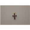 Image 1 : ONE 10KT YELLOW GOLD RUBY SET CROSS PENDANT. FOUR CLAW WITH A TOTAL OF 6 ROUND CUT MIXED RUBIES.