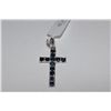 Image 1 : ONE STERLING SILVER NATURAL BLUE SAPPHIRE CROSS PENDANT. MEASURES 32X18MM. 12 BLUE SAPPHIRES