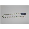 Image 2 : ONE 14KT YELLOW GOLD NATURAL EMERALD AND WHITE SAPPHIRE STATION DESIGN BRACLET. 9 OVAL EMERALDS