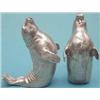 Image 1 : A pair of modern cast silver novelty condiments, modelled as seals, 3ins., 1969  £300-500...