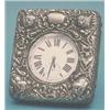 Image 1 : A late Victorian silver mounted leather travelling watch case with Reynolds angel decoration £180...
