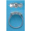 Image 1 : A white gold claw-set 3-stone diamond ring, the centre stone 1.12cts and the side stones 1.6cts £...