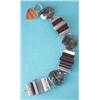 Image 1 : A Scottish silver mounted banded and moss agate bracelet with foliate engraved safety padlock cla...