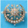 Image 1 : An Edwardian gold star-and-crescent brooch set with a diamond and seed pearls £120-150...