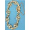 Image 1 : A French gold flexible bracelet of pierced flowerhead linking £300-500...