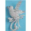 Image 1 : A French white gold brooch designed as a bird of paradise pave-set brilliant and baguette cut dia...