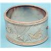 Image 1 : A Victorian white metal hinged bangle, the front engraved birds, bamboo and reeds £100-150...