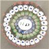 Image 1 : A late concentric millefiori weight, the cent...