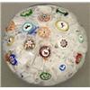 Image 1 : A Baccarat dated scattered millefiori weight...