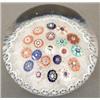 Image 1 : A spaced concentric millefiori weight, the tw...
