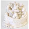 Image 1 : A small ivory okimono of the Shichifukujin in...