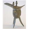 Image 1 : A Shang Dynasty bronze 'jue' cast with taotie...