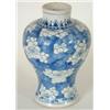 Image 1 : A blue and white small baluster vase painted...