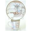 Image 1 : A Chien Lung famille rose cup and saucer, the...