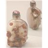 Image 1 : A grey agate rounded rectangular bottle with...