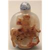 Image 1 : A grey agate rounded square bottle with flaut...