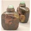 Image 1 : An agate or jasper rounded square bottle carv...
