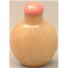Image 1 : A honey agate oviform bottle with relief wick...